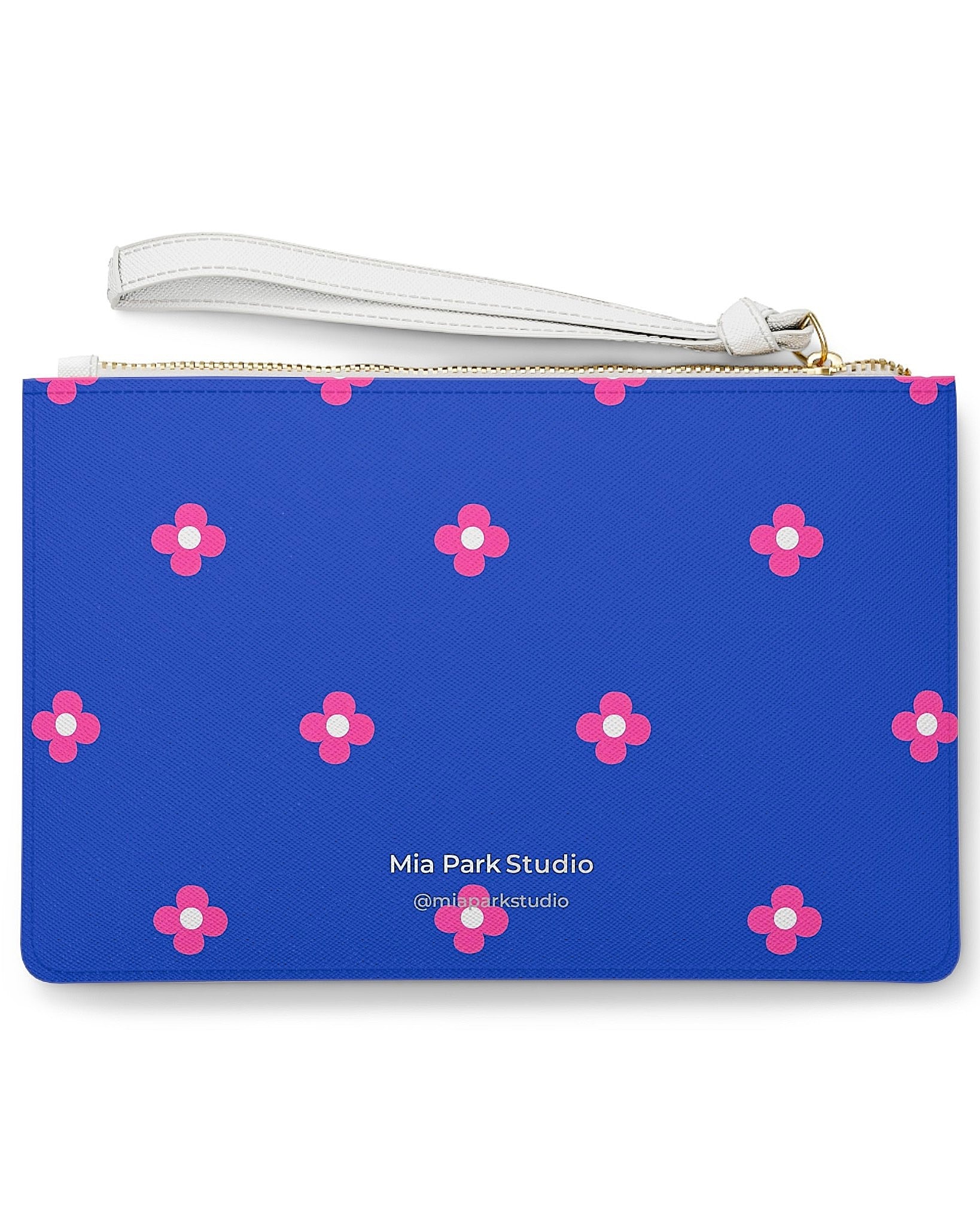 Back of Lucky Tiles clutch bag featuring a playful floral pattern inspired by the muse's flower earrings
