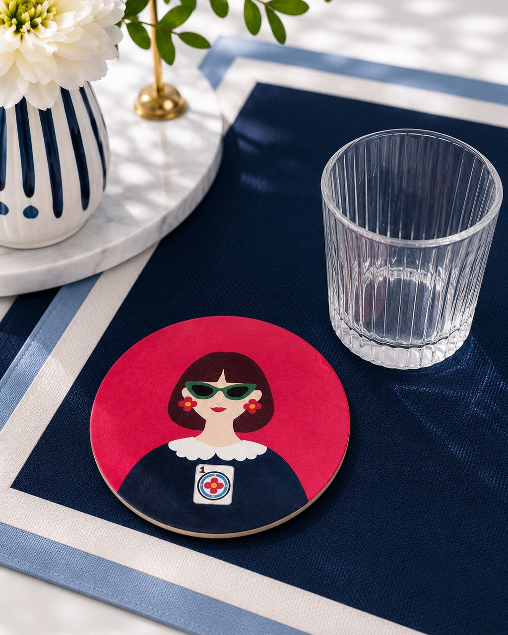 The One and Only Prime Dot Mahjong-inspired coaster on a modern navy and white tabletop