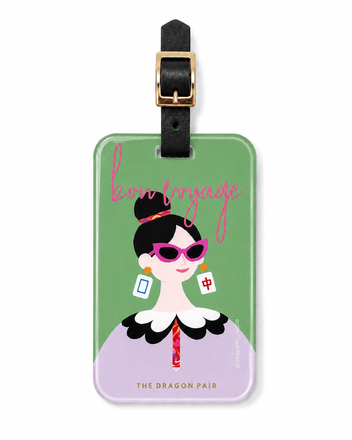 The Dragon Pair luggage tag featuring a stylish modern muse with dragon tile inspired earrings and bold sunglasses against a soft green background